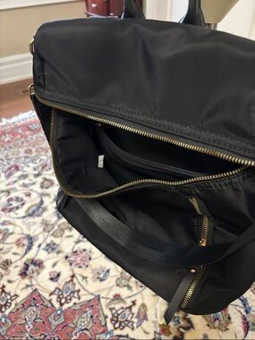 Black Men's Nylon Backpack with Gold Zippers